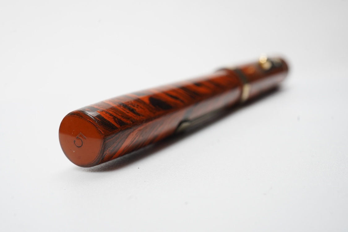 A Waterman Red Ripple No. 5 lever filler with red cap band and fitted with Waterman nib